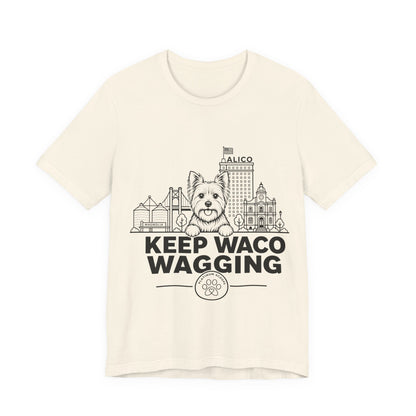 Keep Waco Wagging — Yorkie and Waco skyline artwork on Natural tee