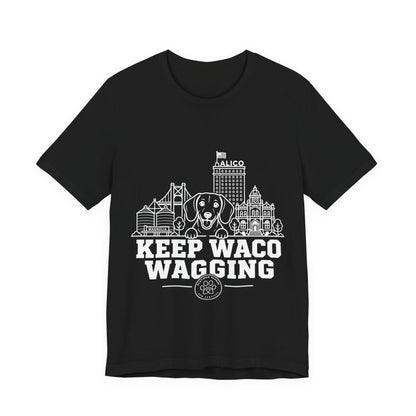 Keep Waco Wagging Dachshund Edition — Dachshund and Waco skyline artwork on Black tee