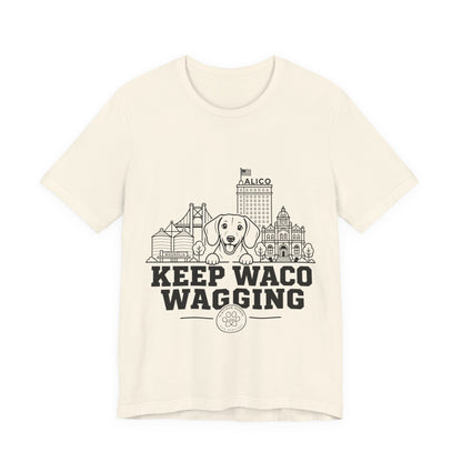 Keep Waco Wagging Dachshund Edition — Dachshund and Waco skyline artwork on Natural tee
