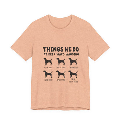 Dog Rescue Volunteer T-Shirt — Waco skyline artwork on Heather Peach tee
