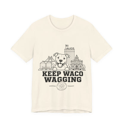 Keep Waco Wagging Pittie Edition — Pittie and Waco skyline artwork on Natural tee